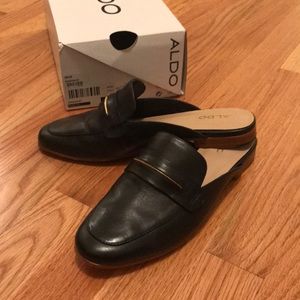 Black slip on loafers with Gold accent